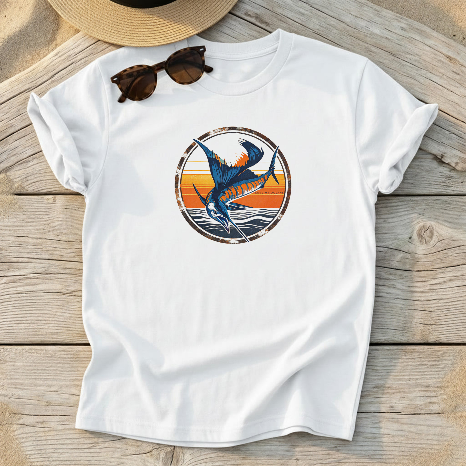 Sailfish Sunset Badge Tee — offshore sailfish fishing shirt, coastal apparel, Love My Oceans