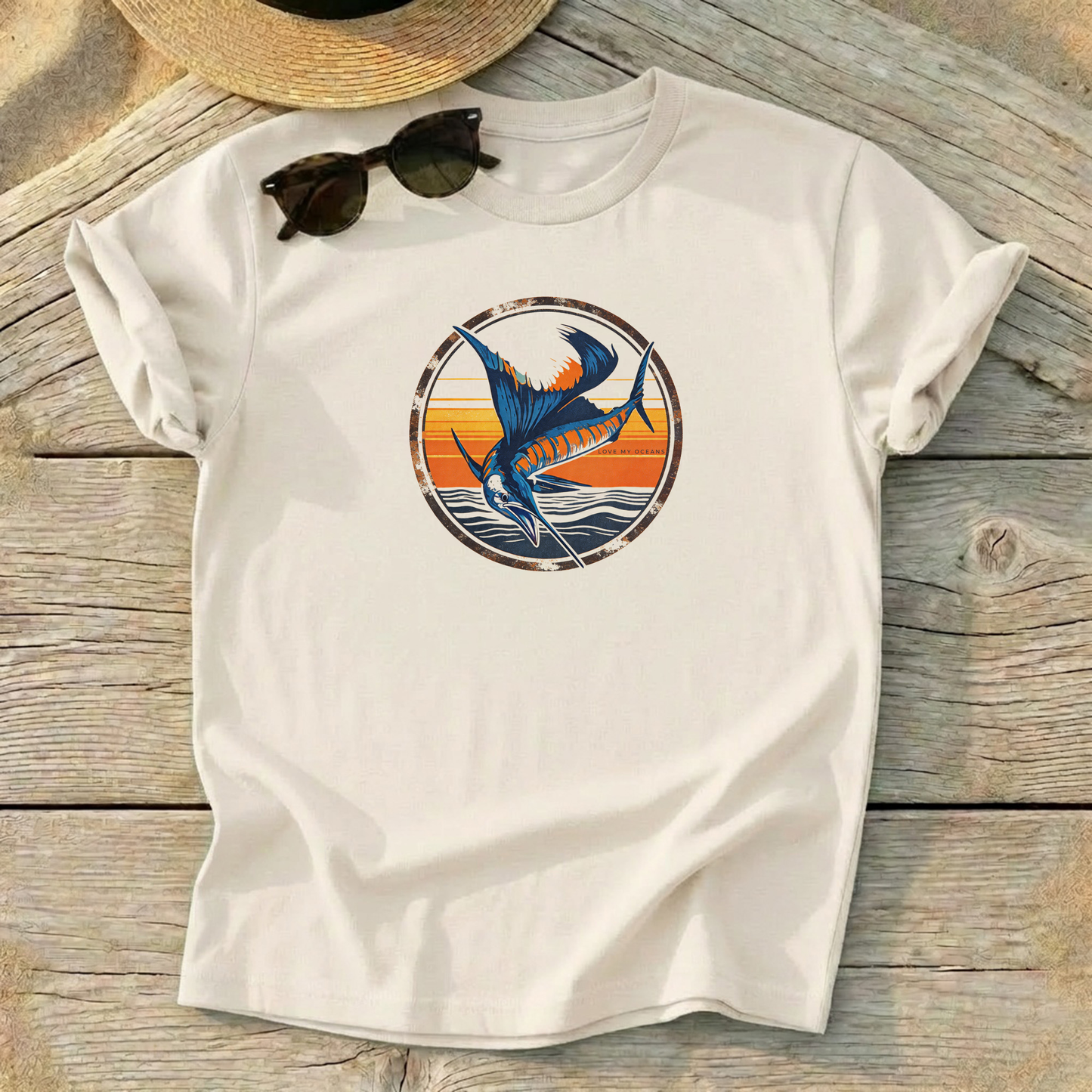 Sailfish Sunset Badge Tee — offshore sailfish fishing shirt, coastal apparel, Love My Oceans